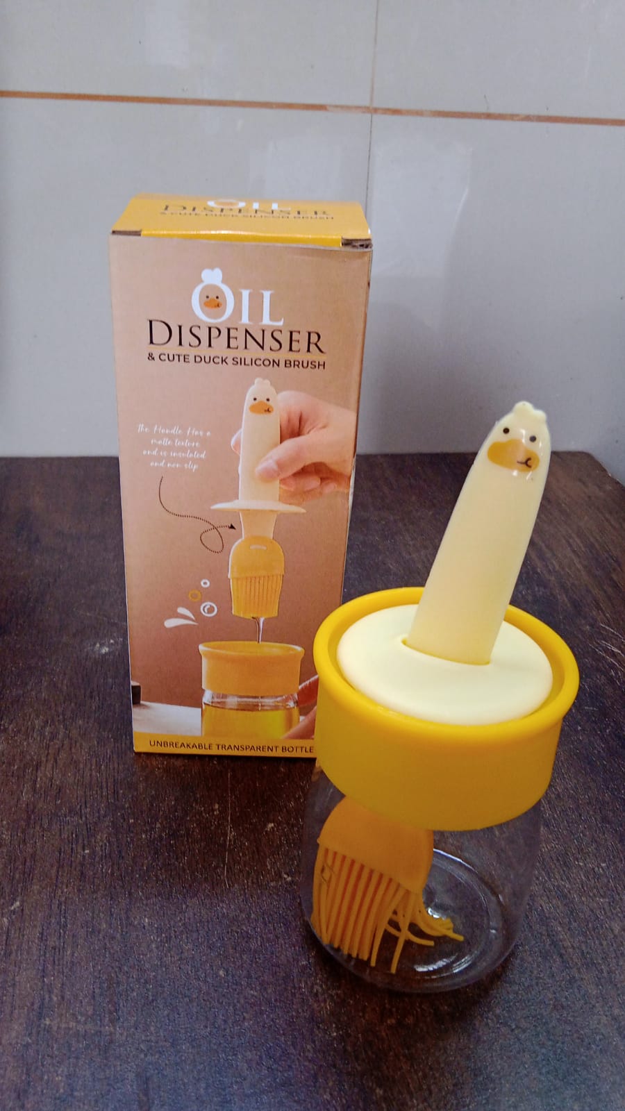 2 in 1 Oil Dispenser with Brush - Cute Kitchen Tool - Market FindsMarket Finds2 in 1 oil dispenser with brush featuring a cute duck silicone brush and transparent bottle