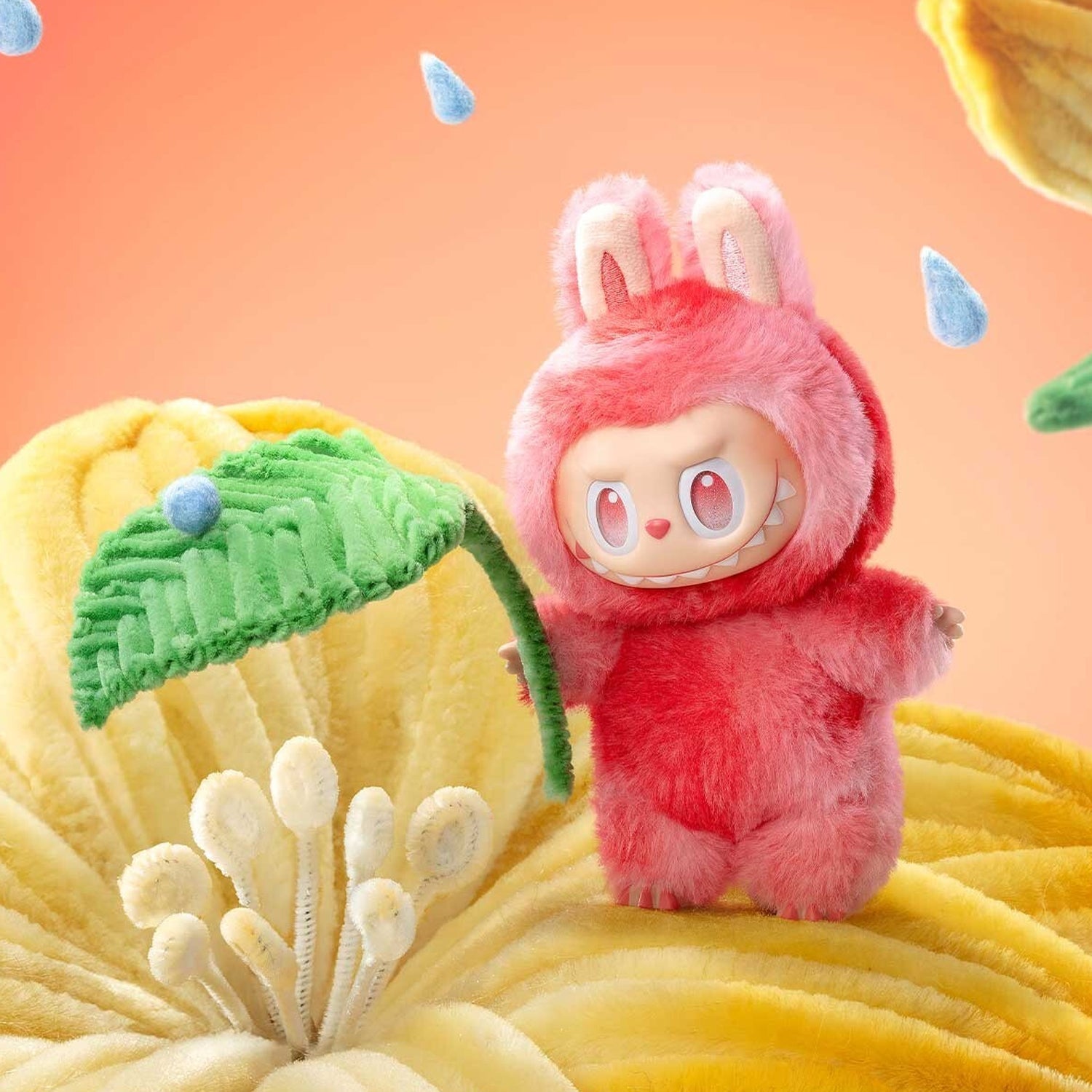 Cute cartoon keychain with hook featuring a pink plush bunny holding a green leaf on a soft yellow flower background