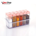 Wukusy plastic spice jar set with six clear containers and pink lids in a transparent holder