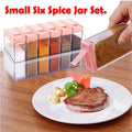 Wukusy plastic spice jar set with six containers and pink lids beside a steak plate