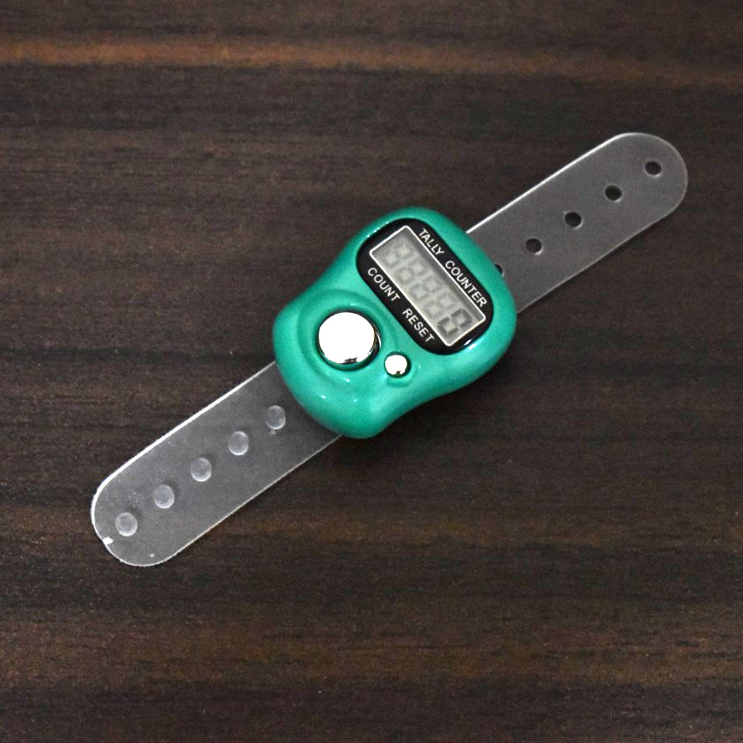 Wukusy digital finger tally counter with adjustable transparent strap on wooden surface