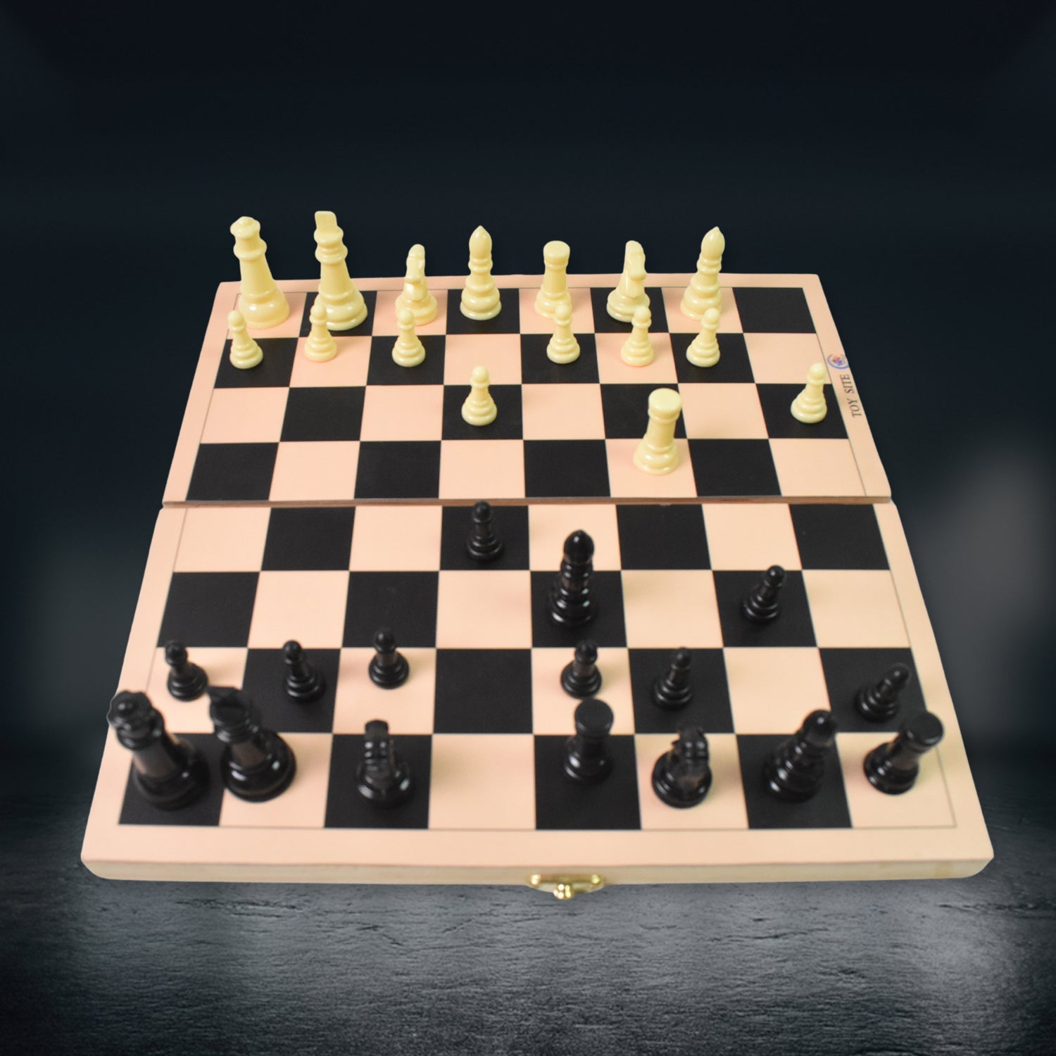 Wukusy folding wooden chess board with black and white pieces set up for play