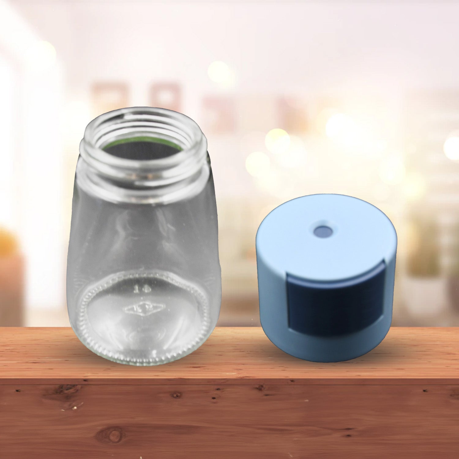 Wukusy glass salt bottle set showing clear glass bottle and blue cap on wooden surface