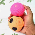 Wukusy sports squeeze balls for kids in pink and orange soccer ball design held in hand
