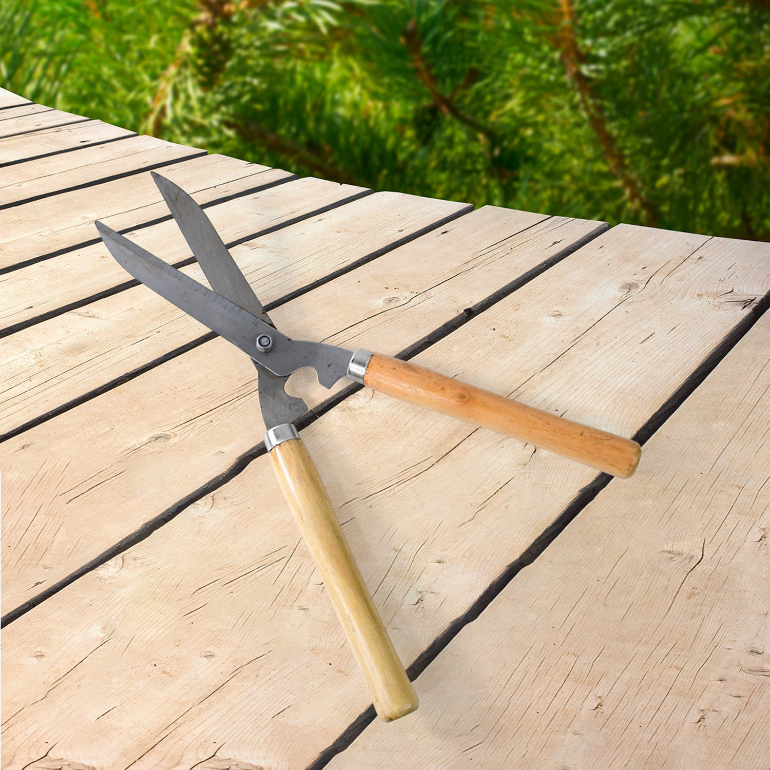 Wukusy heavy-duty hedge shears with wooden handles on wooden deck for garden trimming