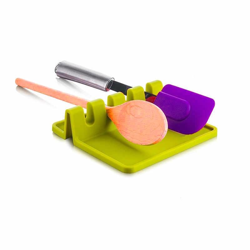 Kitchen Utensil Holder with Drip Tray, Green - Market FindsMarket Findsgreen kitchen utensil holder with slots holding wooden spoon and purple spatula