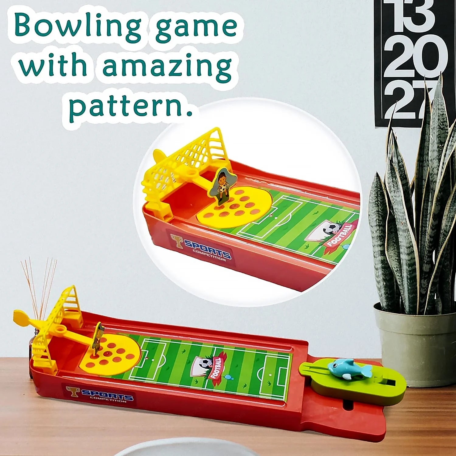 mini finger football game for kids with colorful bowling game design on wooden table