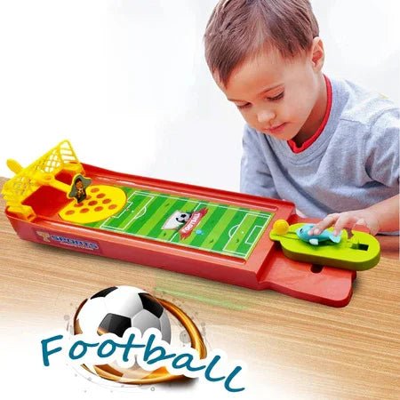 mini finger football game for kids with a boy playing on a tabletop football field toy