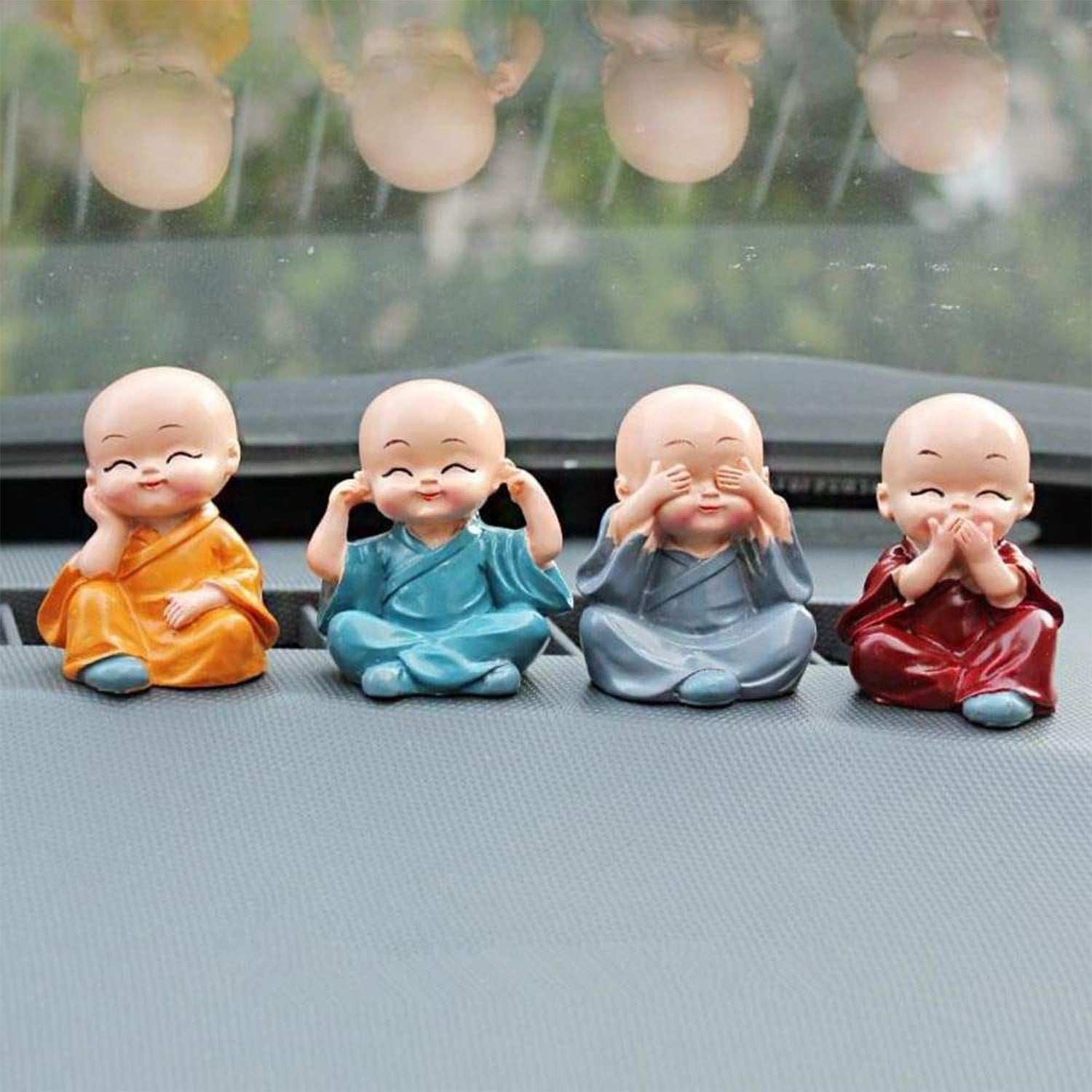 Miniature Buddha Decor for Car Dashboard Set - Market FindsMarket Findsminiature Buddha decor for car dashboard featuring four small meditating monk figurines in colorful robes