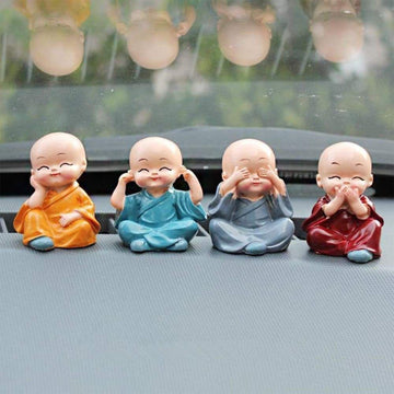 Miniature Buddha Decor for Car Dashboard Set - Market FindsMarket Findsminiature Buddha decor for car dashboard featuring four small meditating monk figurines in colorful robes