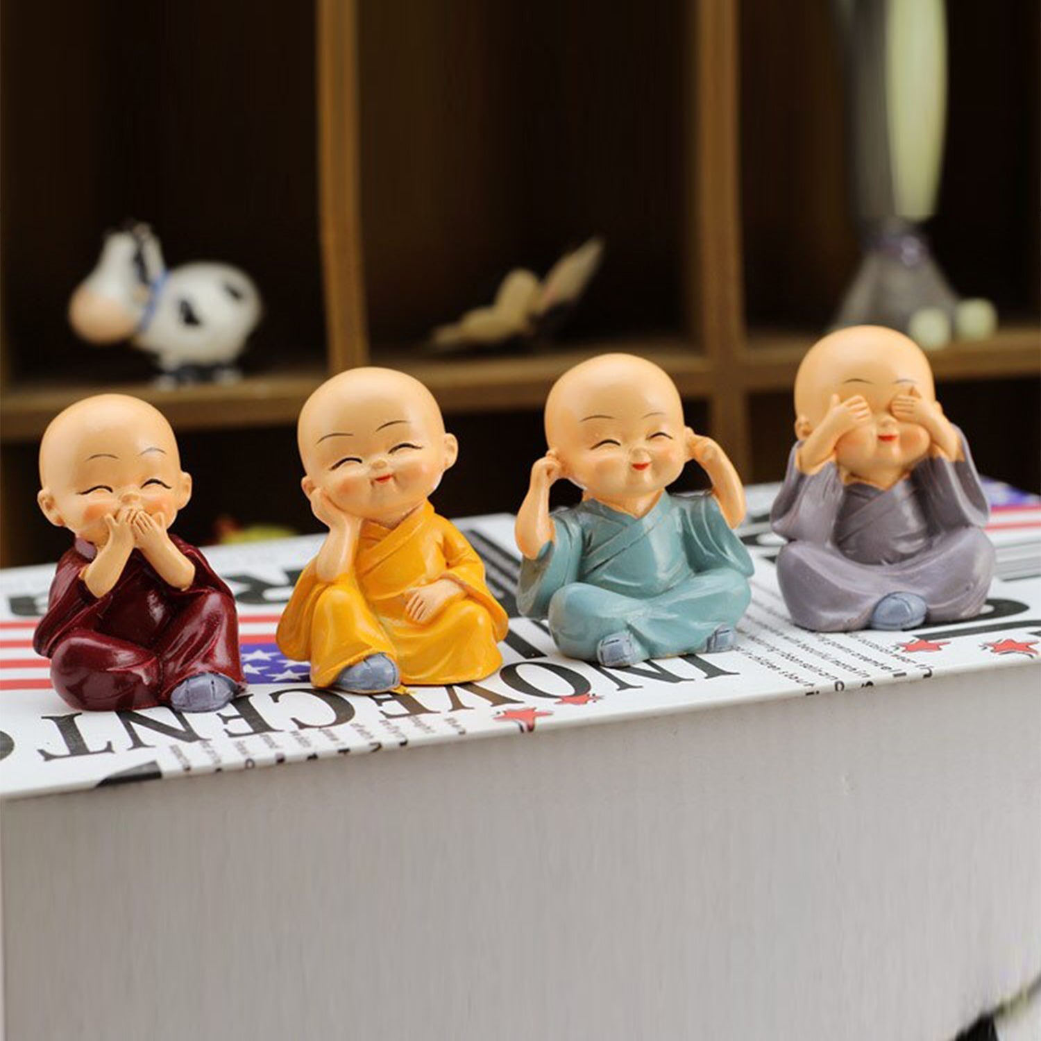 Miniature Buddha Decor for Car Dashboard Set - Market FindsMarket Findsminiature Buddha decor for car dashboard set of four colorful smiling monk figurines