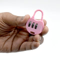 Wukusy pink combination lock for luggage held between fingers with three dials for secure locking