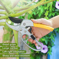 Wukusy professional gardening shears with yellow handle cutting a plant branch outdoors