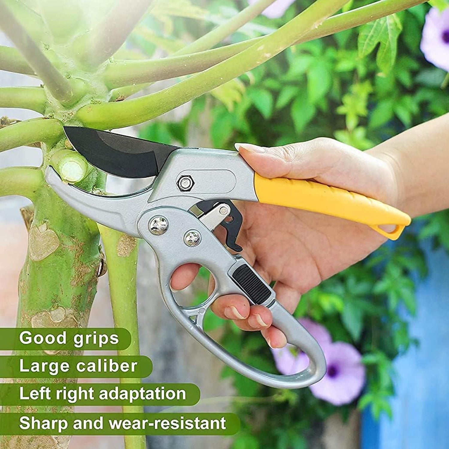 Wukusy professional gardening shears with yellow handle cutting a plant branch outdoors
