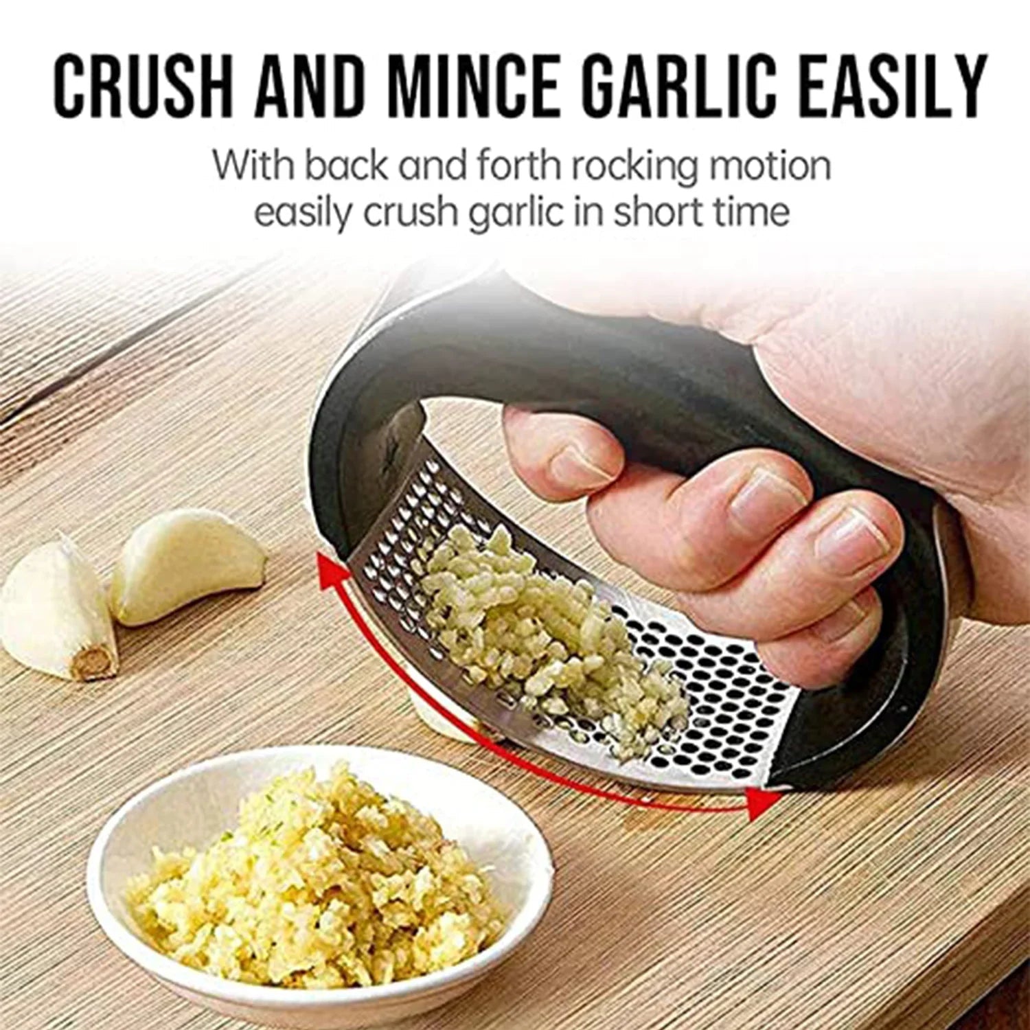 Stainless Steel Garlic Crusher with Ergonomic Handle - Market FindsMarket Findsstainless steel garlic crusher with ergonomic handle crushing garlic cloves over a bowl