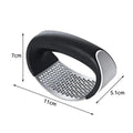 Stainless Steel Garlic Crusher with Ergonomic Handle - Market FindsMarket Findsstainless steel garlic crusher with ergonomic black handle and curved crushing surface