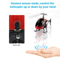 Wukusy remote control helicopter for kids with gesture sensor mode flying above a hand