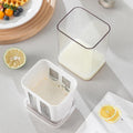 Wukusy 2 in 1 yogurt maker and strainer with white container and transparent jar on kitchen counter